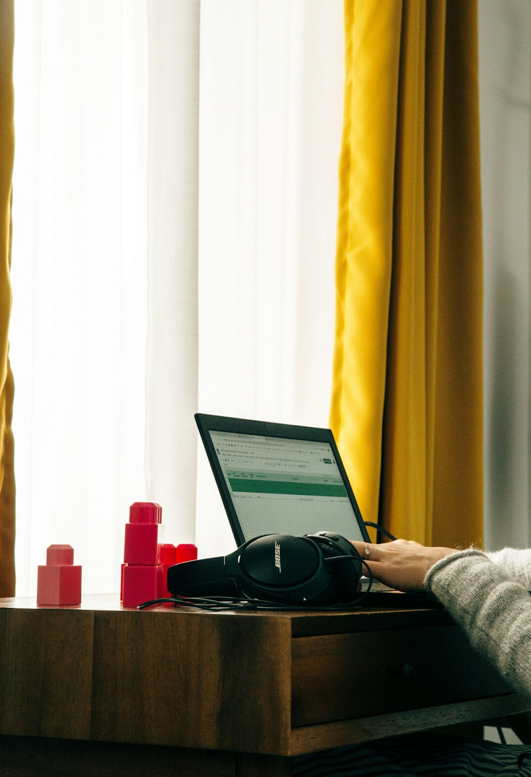 person using laptop at home